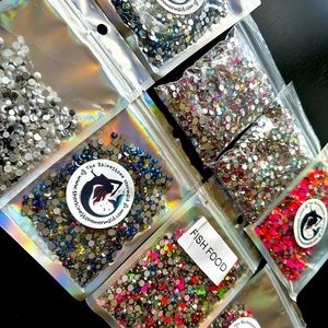 Tiktok Rhinestones from Rhinestone Mermaid. Some open some never been opened.